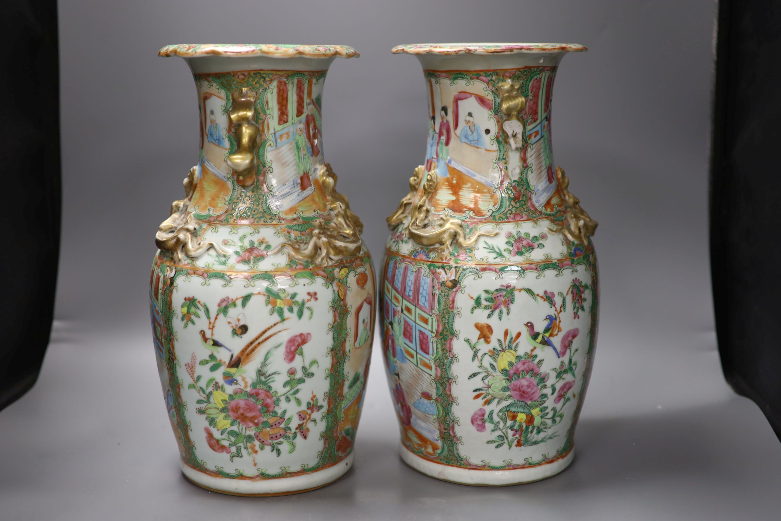 A pair of late 19th century Chinese famille rose vases, height 36cm